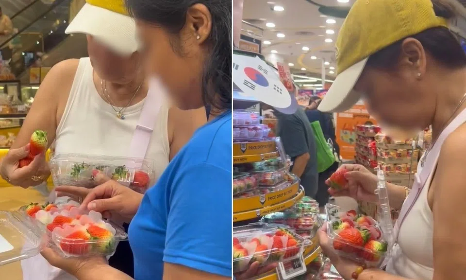 A woman was criticised for swapping strawberries between two boxes at a FairPrice outlet. 