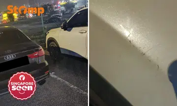 Malaysian motorist waits for Singapore Audi driver, collision