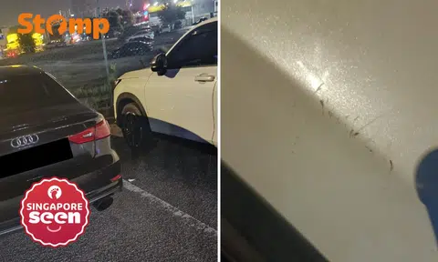 Malaysian motorist waits for Singapore Audi driver, collision
