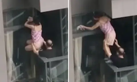 HK woman living on 7th floor literally puts her life on the edge -- just to clean windows