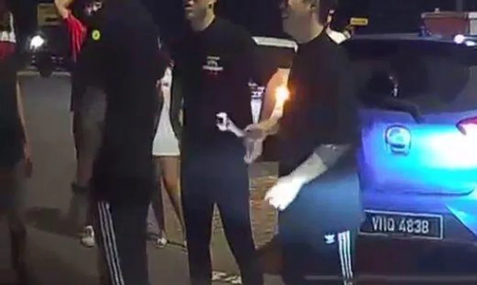 The video shows one man holding a wrench. 