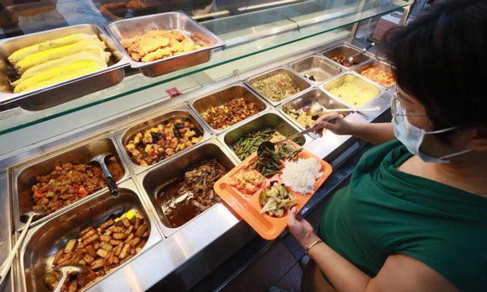 NTU stall owner explains her food prices after parent's complaint, says this is not cai fan