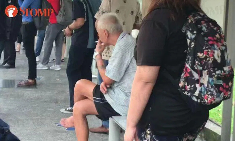 Uncle, it's illegal to smoke at bus stops 