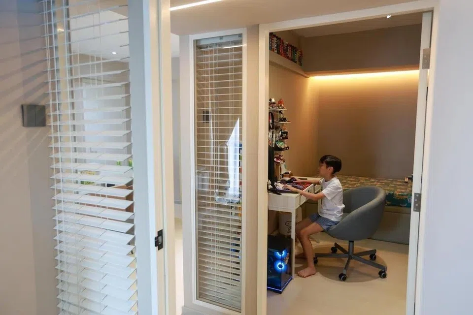 Two of the boys’ bedrooms in the Lims’ flat have been fitted with fixed glass panels to make up for the lack of windows.