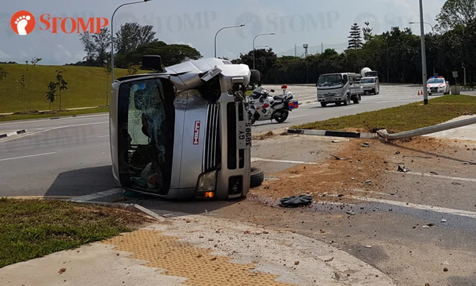 34-year-old driver sent to hospital after van overturns along Changi ...
