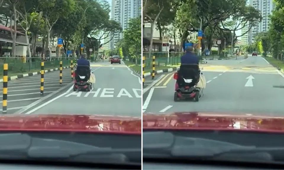 The car behind him has to slow down to match his pace on road.