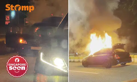 Mercedes-Benz on fire near Tuas Checkpoint