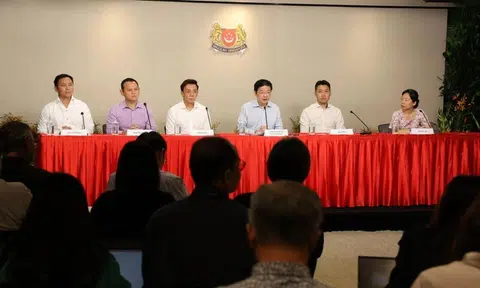 PM Lawrence Wong (third from right) announcing a Cabinet reshuffle at a press conference on July 22. With him are (from left) Goh Pei Ming, Zaqy Mohamad, Jeffrey Siow, David Neo and Jasmin Lau.