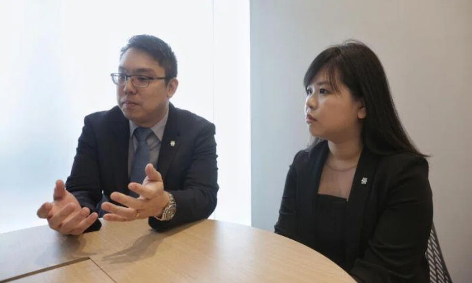 UOB Tampines deputy branch manager Denethor Wong and assistant branch manager Sheila Yap. Photo: The Straits Times