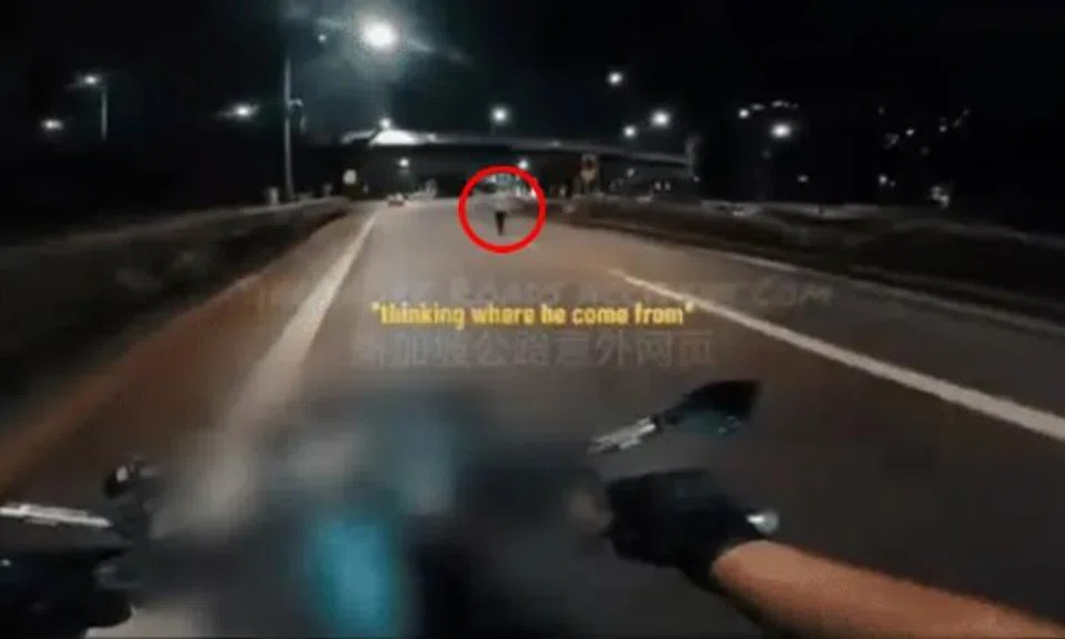 Drunk man walks in middle of expressway, motorcyclist stops to help get him to safety