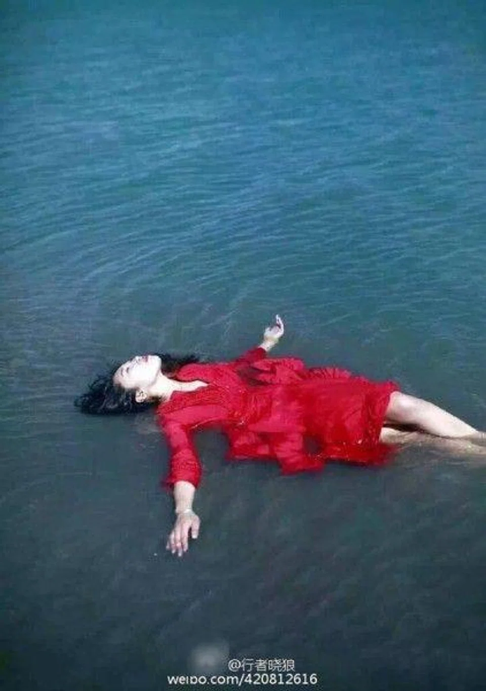 Tibetans upset by photos of woman posing nude by sacred lake