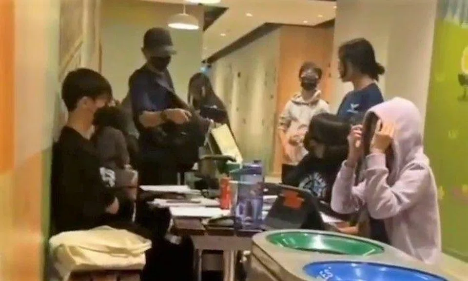 In a clip of the incident uploaded to the Sgfollowsall Telegram channel, the students can be heard explaining to the man that they only sat down at the table to study after he had left the area for a few hours.