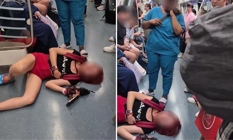 The woman was lying on the floor of a train carriage.