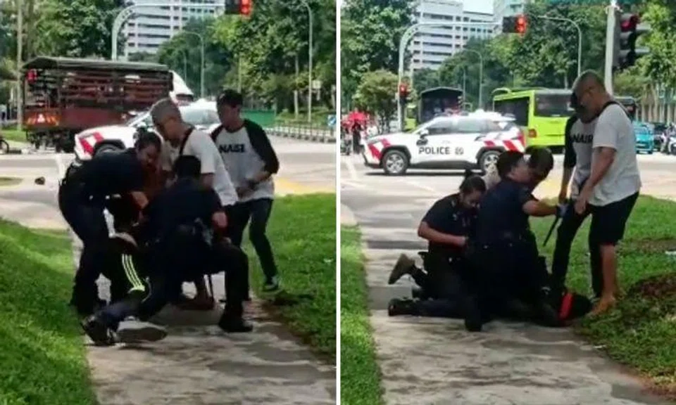 Man lies down at Yishun junction and turns aggressive after police try to assist him