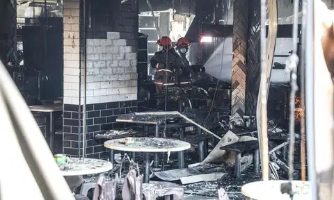 Several stalls in a coffee shop at Block 106 Hougang Avenue 1 caught fire early on May 5.