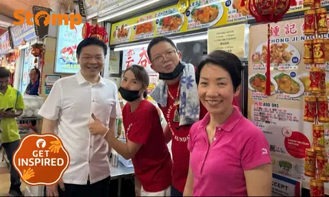 After 17 years in oil and gas, Stomper is 'happier' running wanton mee stall with his wife