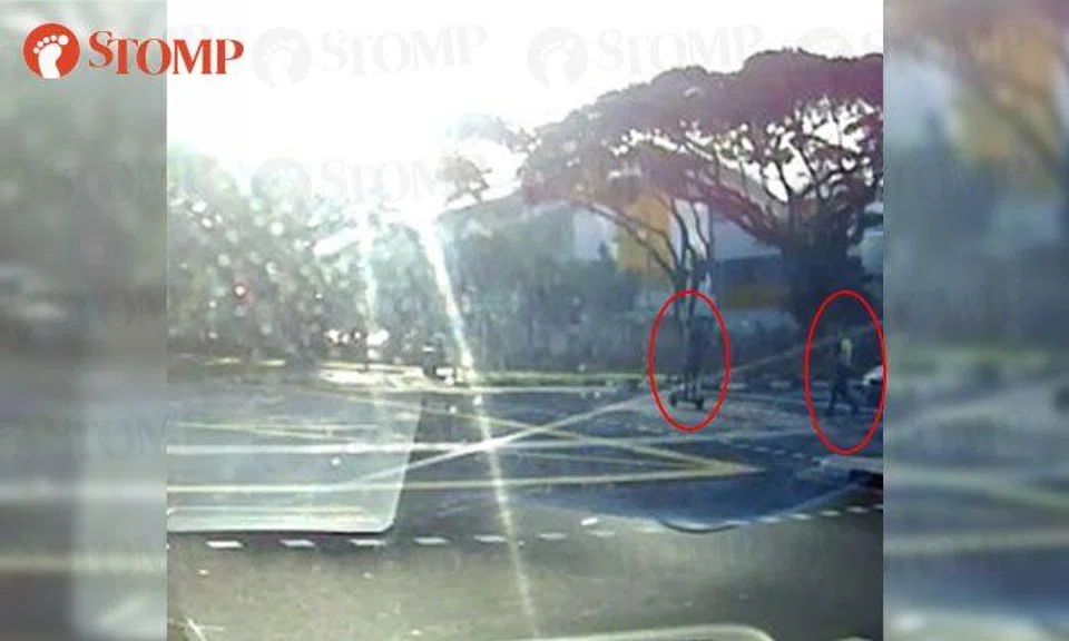  E-scooter user rides away from enforcement officer at Sims Drive junction