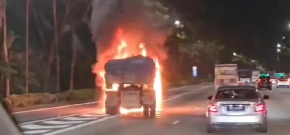 In a video posted online, the front of a stationary truck,  which was on the left lane of the PIE, was seen engulfed in flames.