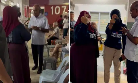 Activists confront Shanmugam at Chong Pang Meet-the-People session, shout 'coward' as he walks away