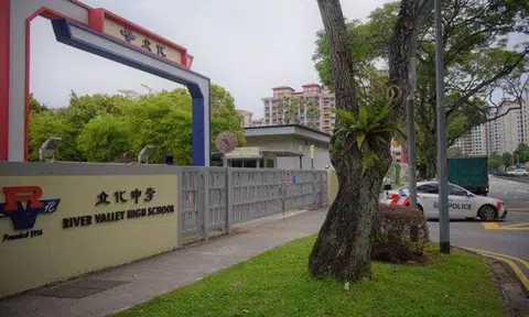 A police car is seen leaving River Valley High School on July 19, 2021. ST PHOTO: MARK CHEONG
