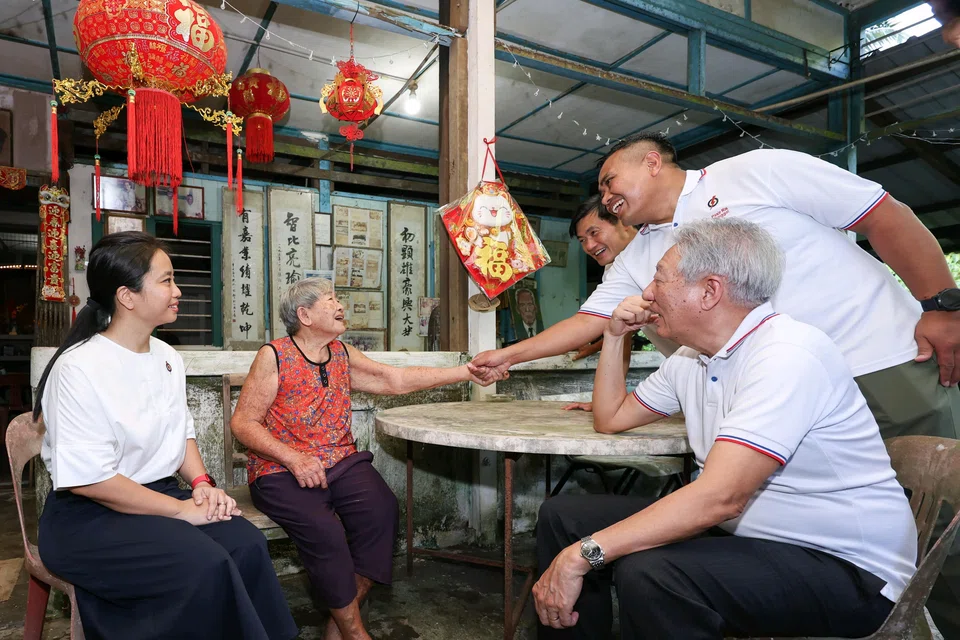 The PAP team, including Senior Minister Teo Chee Hean (far right), conducted a walkabout on Pulau Ubin, which is under the the newly drawn Pasir Ris-Changi GRC, on April 11.