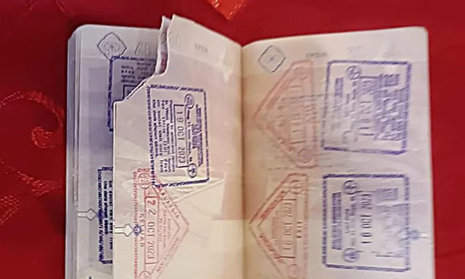 S'pore woman doesn't know how passport got torn, says JB customs officer asked for $60