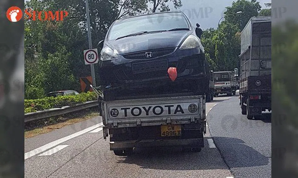 Surely there's a better way to transport this car than using a pick-up truck?