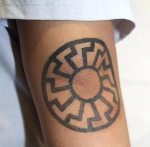 In September 2024, Nick Lee Xing Qiu got a tattoo of a sonnenrad, a symbol featured on Brenton Tarrant’s manifesto.