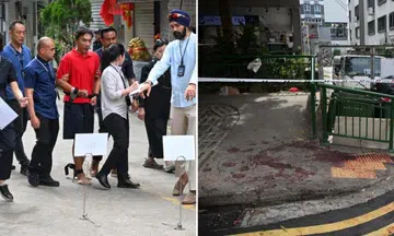 Accused in Geylang murder brought back to crime scene