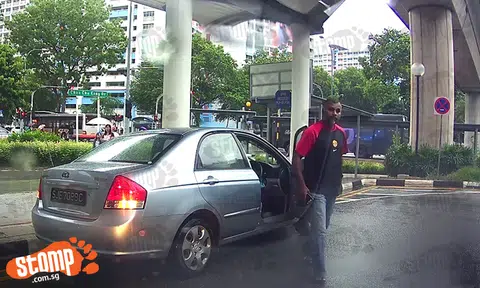 Driver parks at Yew Tee MRT station's pick-up point on rainy day, then confronts man who honked at him