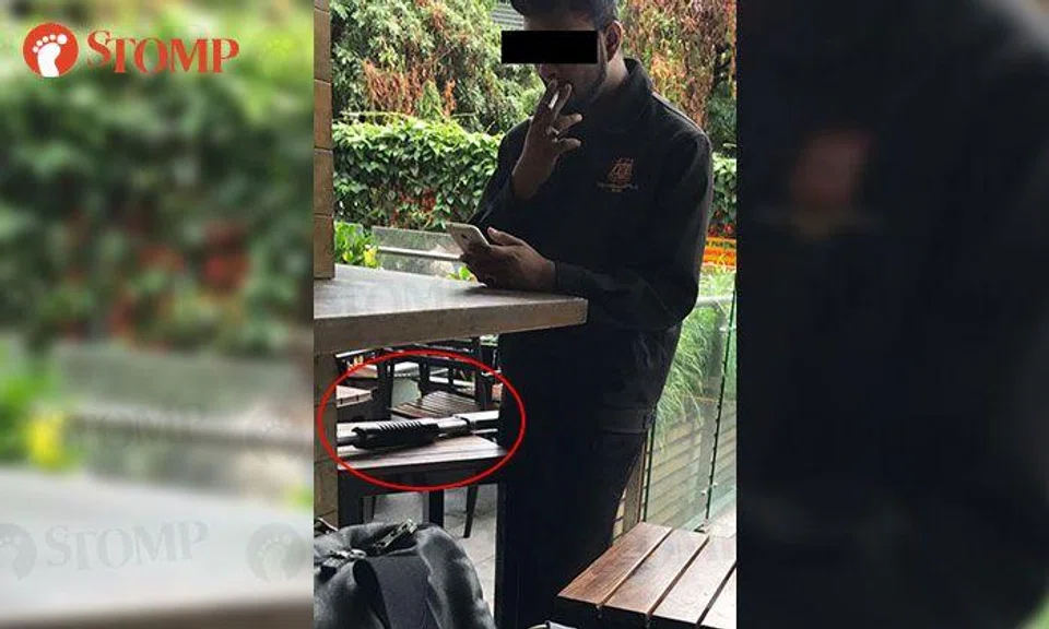 Malaysian security guard leaves shotgun unattended while on a smoke break