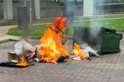 Rubbish bin catches fire at Choa Chu Kang, residents captured on video rushing to contain flames
