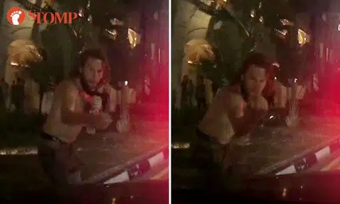 Half-naked man steps in front of Bentley driver, flashes middle finger and tells him to "donate"