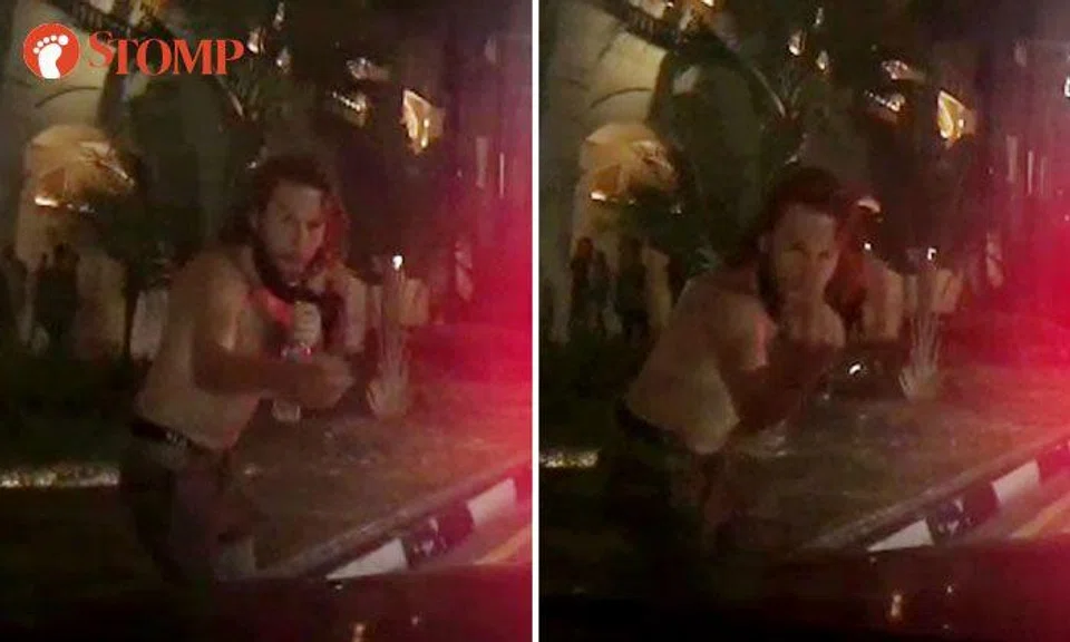 Half-naked man steps in front of Bentley driver, flashes middle finger and tells him to "donate"