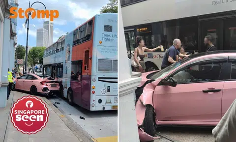 Pink honda crashes into pillar after accident with SBS Transit bus in Bras Basah