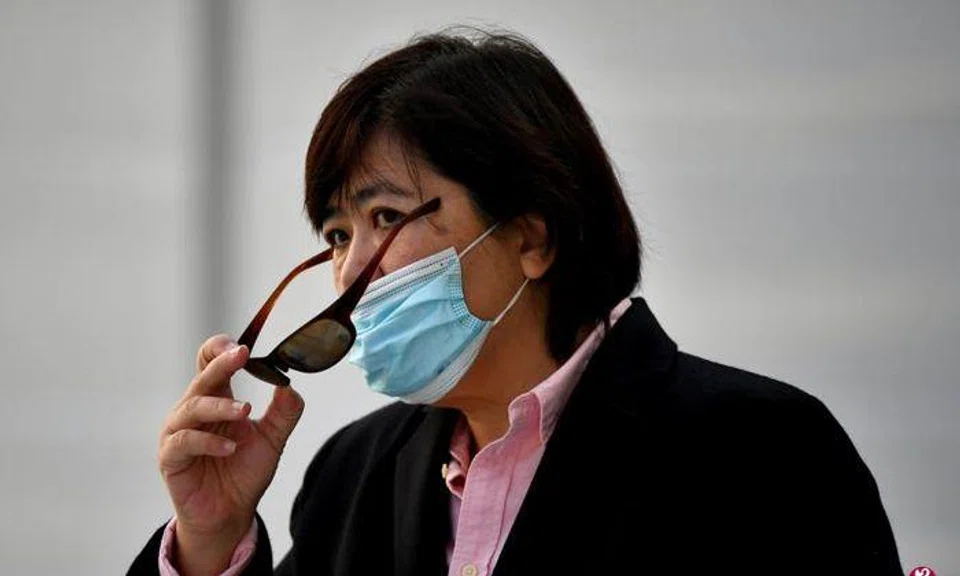 Authorities investigating 'Badge Lady' for walking around Jewel Changi Airport unmasked