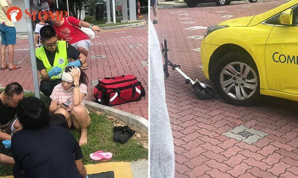 E-scooter rider and 7-year-old pillion rider taken to hospital after crashing into taxi in Yishun