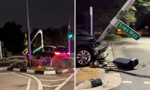 BMW crashes into traffic light at Nicoll Highway while fleeing police, driver arrested for drink driving