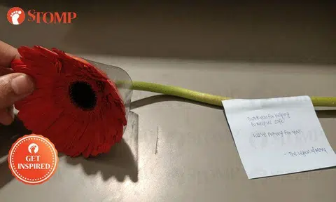 Security guard at Jubilee Square heartened to receive flower with note: 'Thanks for keeping us safe'