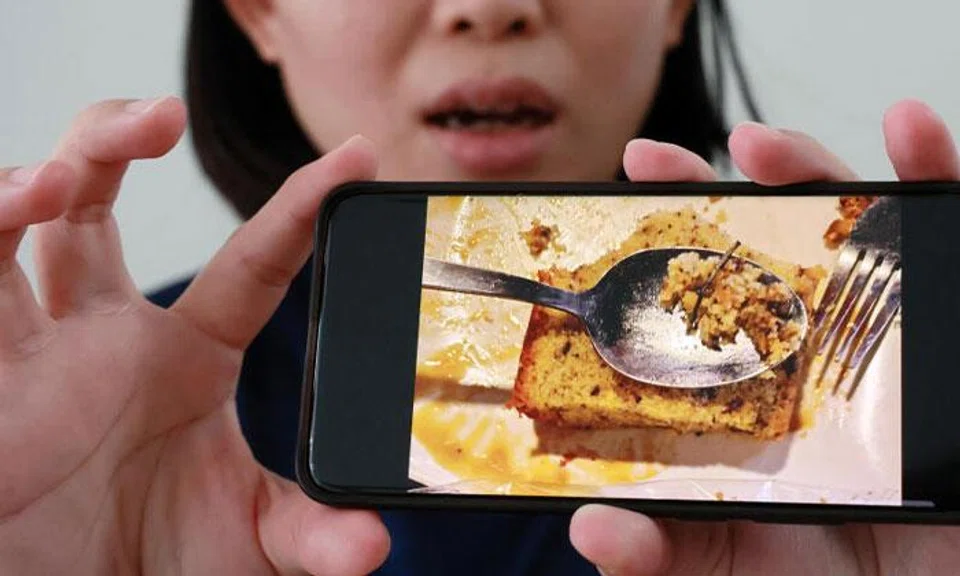 Ms Rong shared that the walnut cake from Koufu located at Waterway point had a rusty nail inside. PHOTO: SHIN MIN DAILY NEWS