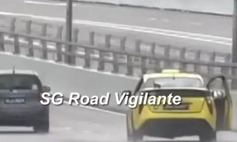 ComfortDelGro investigating after taxi seen travelling with open door