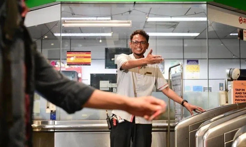 Mr Husri Hussein, an assistant station manager at Dover MRT station, gently approached the young man with special needs and calmed him down.