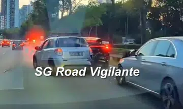 a light grey suzuki car crashes into a black car on the central expressway
