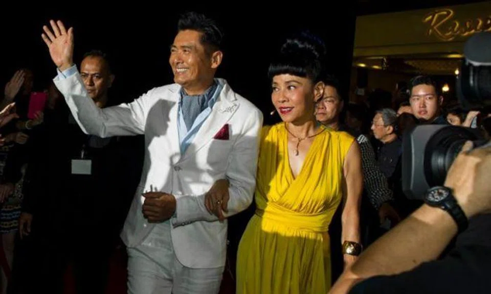 Chow Yun Fat and his Singaporean wife walked the red carpet together at the Cold War 2 gala premiere held at the skating rink at The Shoppes at Marina Bay Sands on 5 July 2016. Photo: Marina Bay Sands