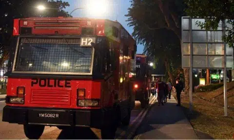 Two anti-riot vehicles were deployed in the search for the 28-year-old man. PHOTO: LIANHE ZAOBAO