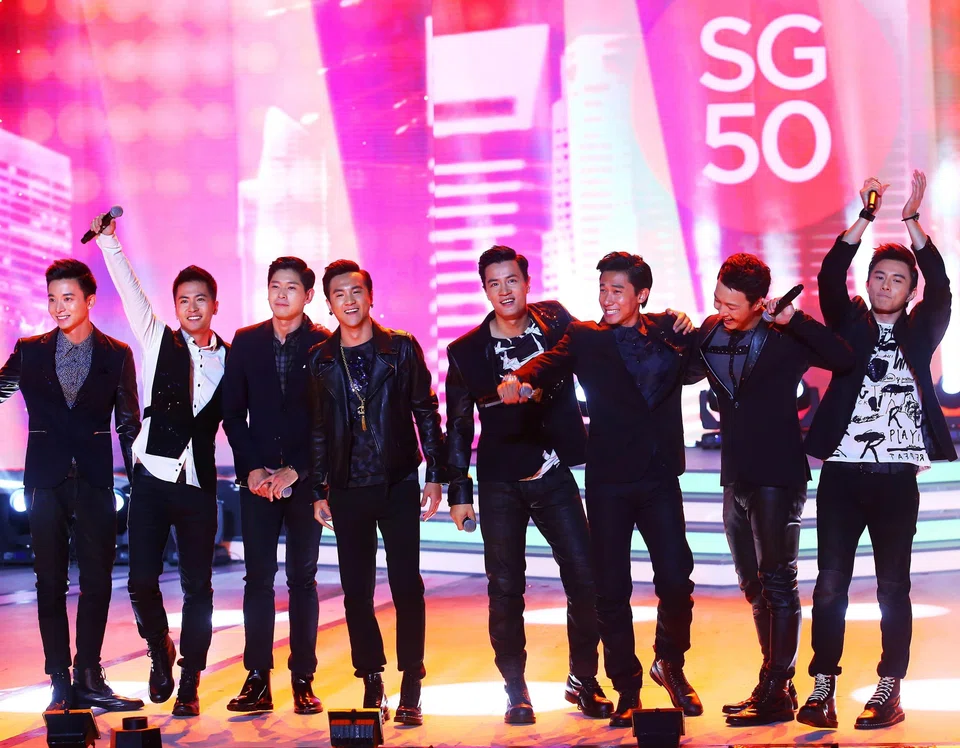 The Eight Dukes of Caldecott Hill, (from left) Aloysius Pang, Xu Bin, Romeo Tan, Ian Fang, Zhang Zhenhuan, Desmond Tan, Jeffrey Xu and Shane Pow, performing at the Celebrate SG50 countdown show at The Float @ Marina Bay on Dec 31, 2014. PHOTO: TNP FILE