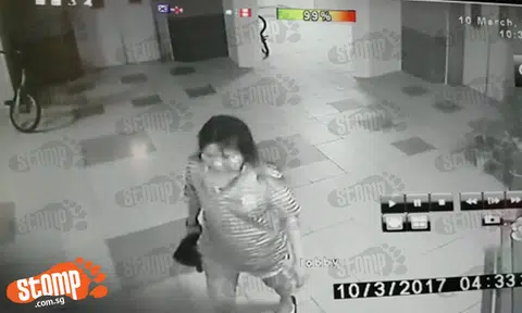 Woman helps herself to 'free' shoes at Blk 171 Toa Payoh Lor 1 -- and is caught on CCTV
