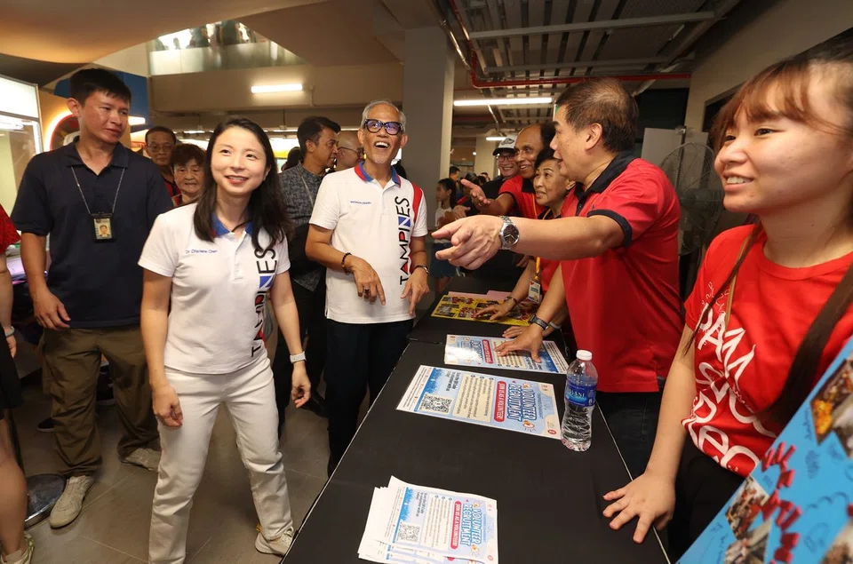 Minister for Social and Family Development Masagos Zulkifli (centre) touring the upgraded Tampines Changkat CC on Feb 23.
