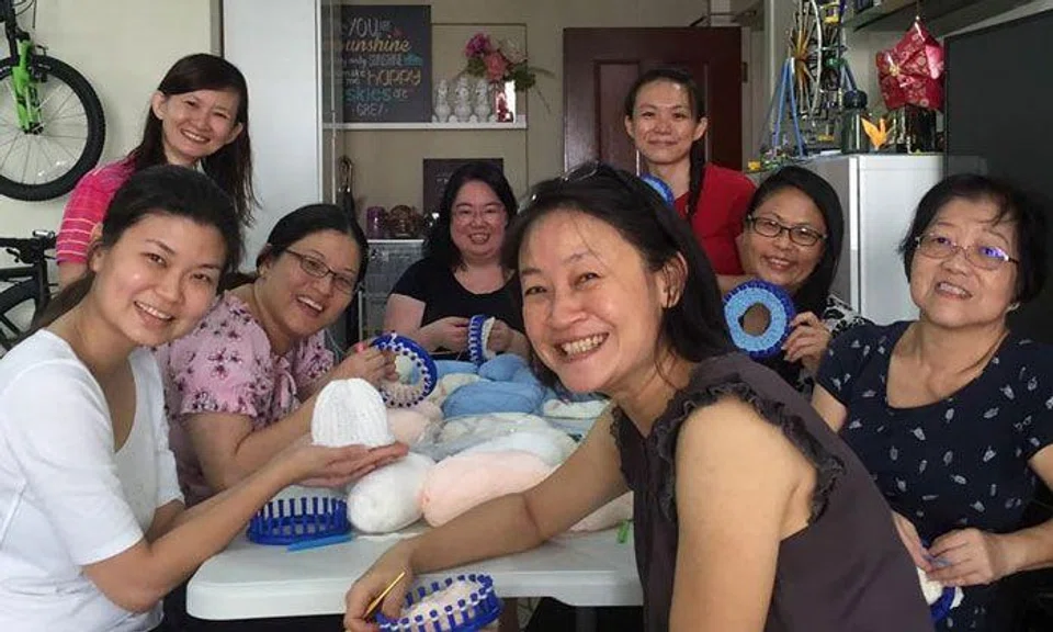 Rosalind (centre, back) and other volunteers at an Angel Gowns gathering. Photo: Rosalind Ang