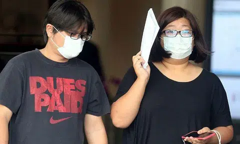 Liu Chin Guan, 36, (left) and his wife, Angela Lim Xiu Yan, 32, were sentenced to jail and fined for running a vice website.